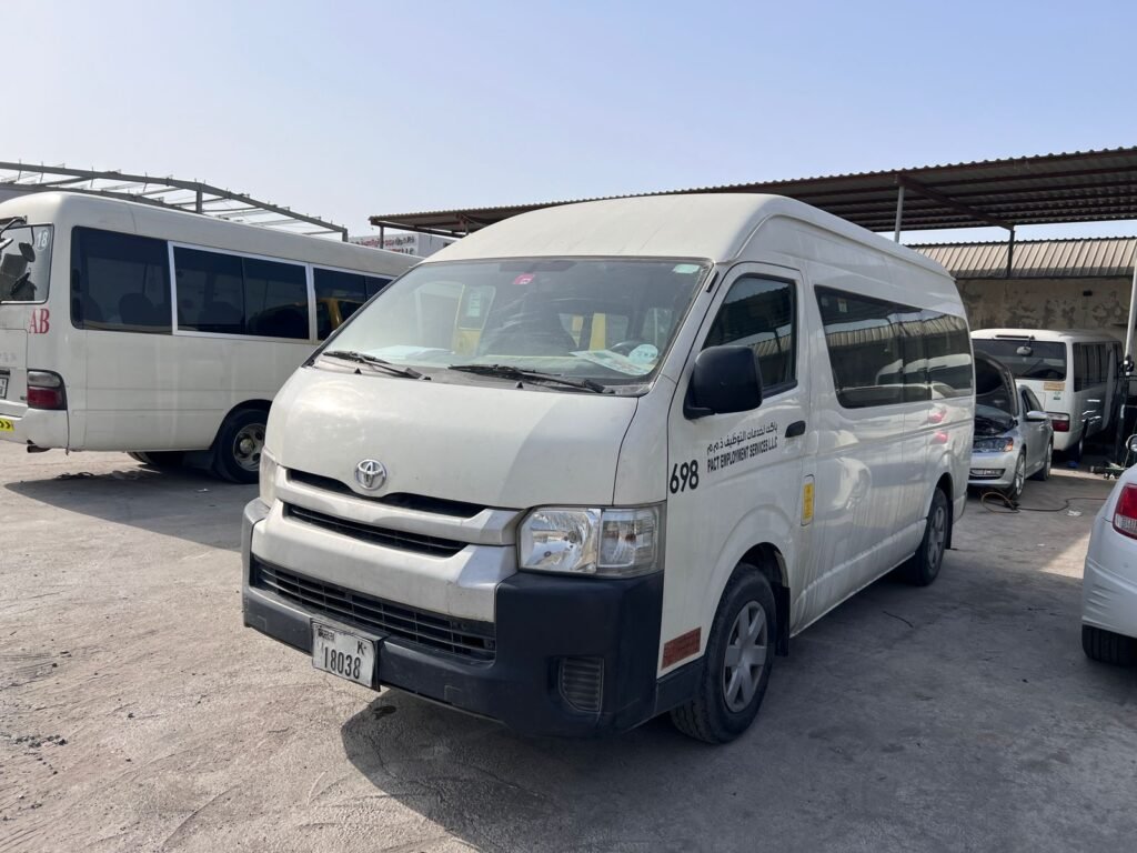 13-seater Toyota Hiace van rental, ideal for group travel and efficient transport in Dubai.