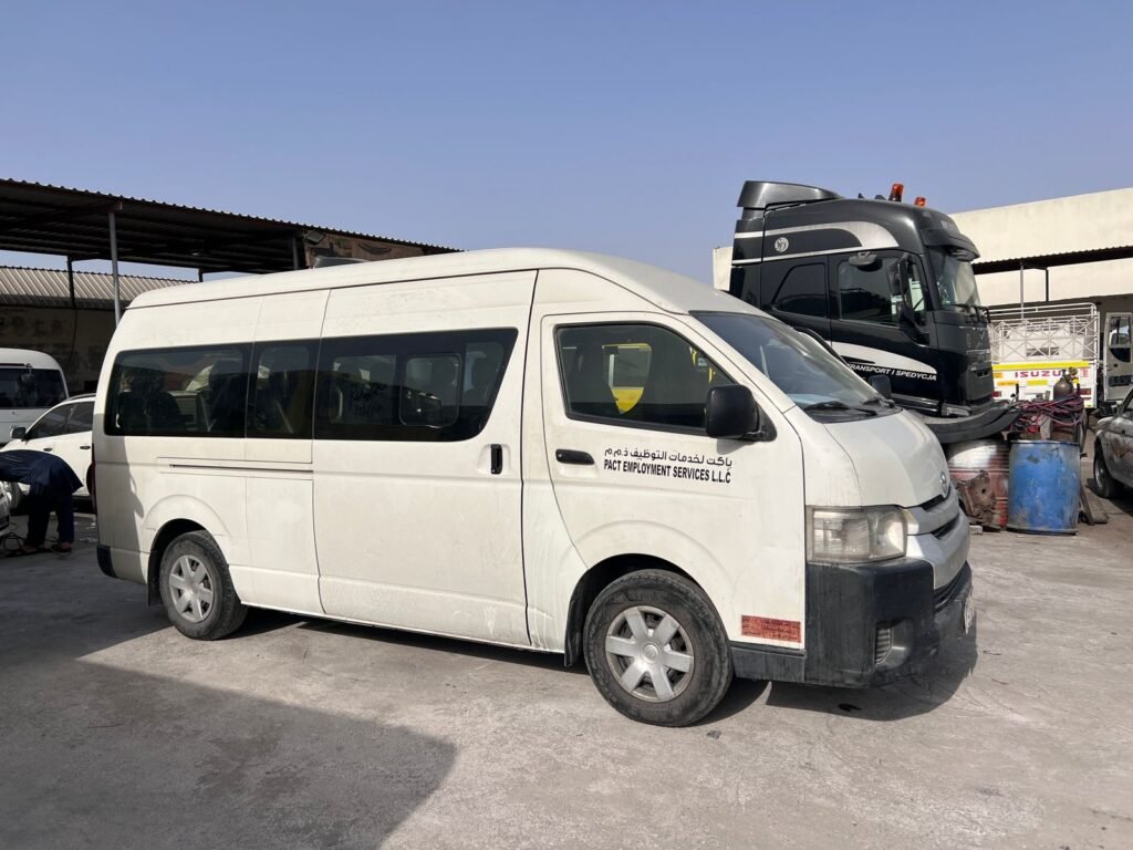 14-seater Toyota Hiace van rental in Dubai, perfect for group transport with comfortable seating and ample space.