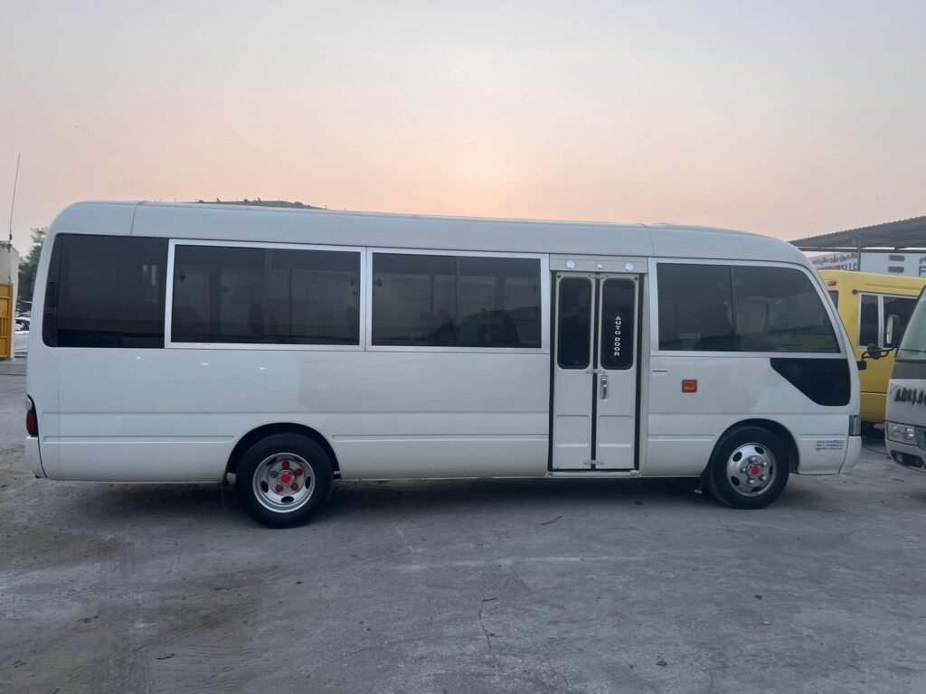 A 30-seater bus available for rental in Dubai, providing spacious seating for comfortable group transportation.